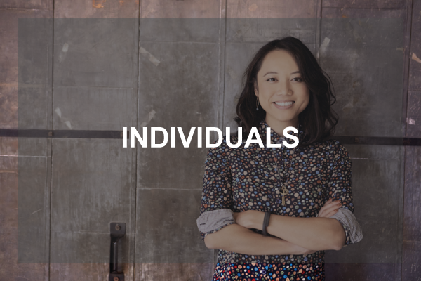 Individuals - image of a female designer against a slate tile background